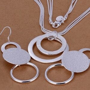 Modern Silver Multi-Strand Necklace with Textured Pendant